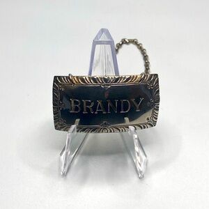 Stieff sterling liquor decanter tag.